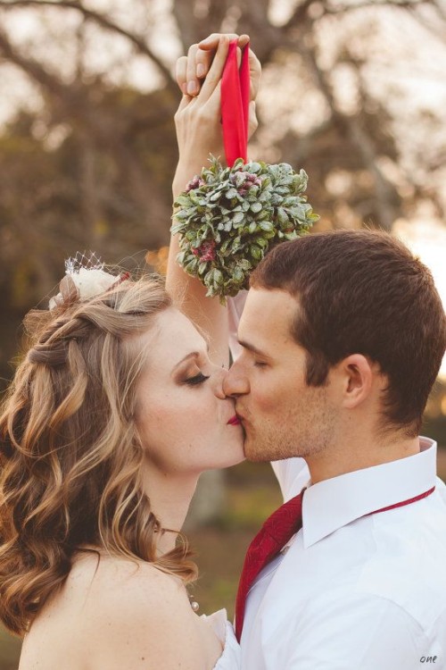 Bride and Groom Mistletoe Kiss