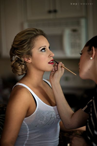 bride getting makeup on